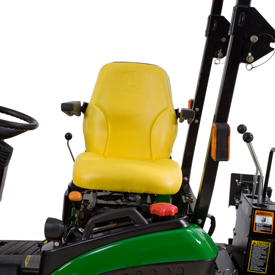 Seat swivels from tractor to backhoe position
