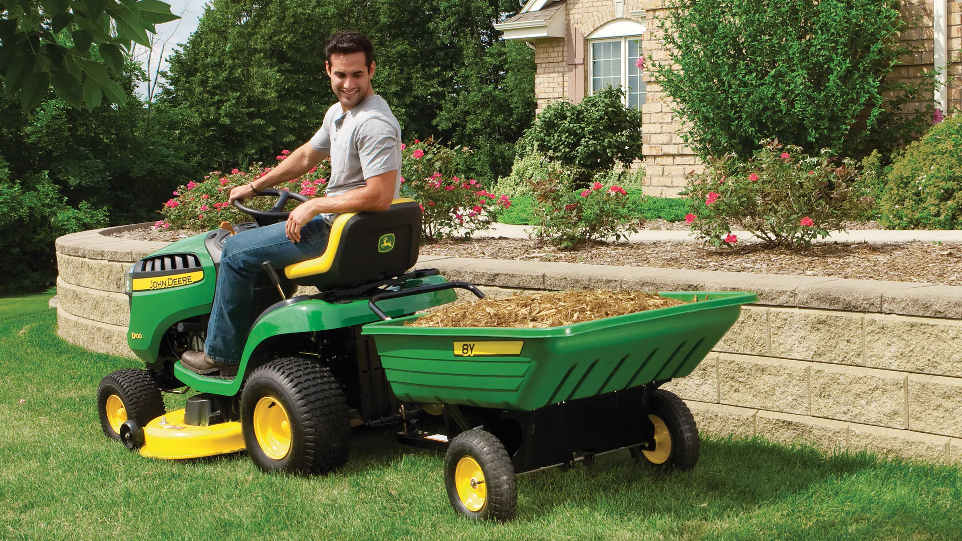 image of cart attached to lawn tractor