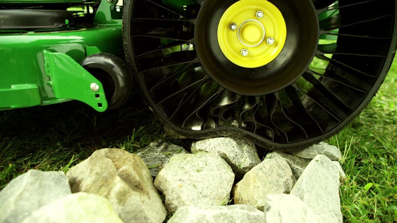 Airless radial tire for heavy-duty lawn care applications